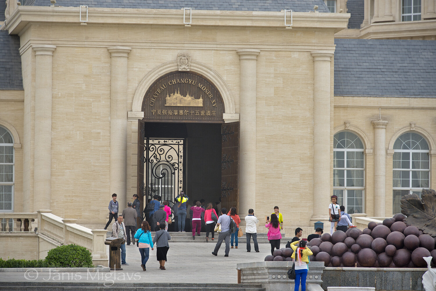 Tourists at main entrance to Chateau Changyu Moser XV winery, Ninxia, China.. 