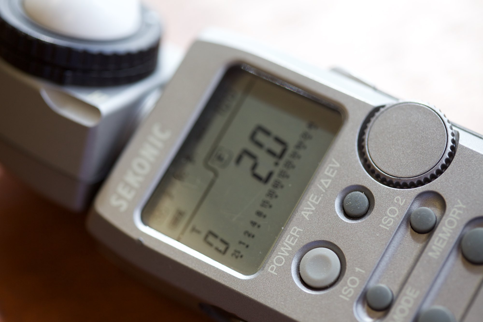 The meter I use most often reads flash as well as ambient light and can give readout in EV.