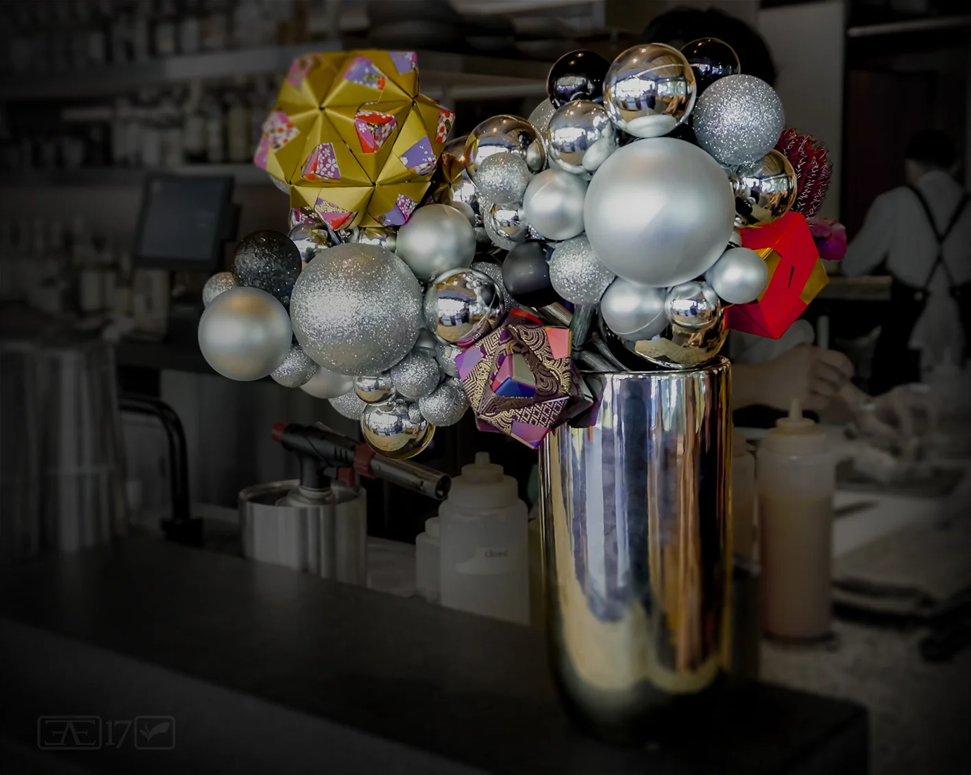 Arrangement near main entrance - Use of unconventional materials to create mass (baubles and origami sonobe balls)