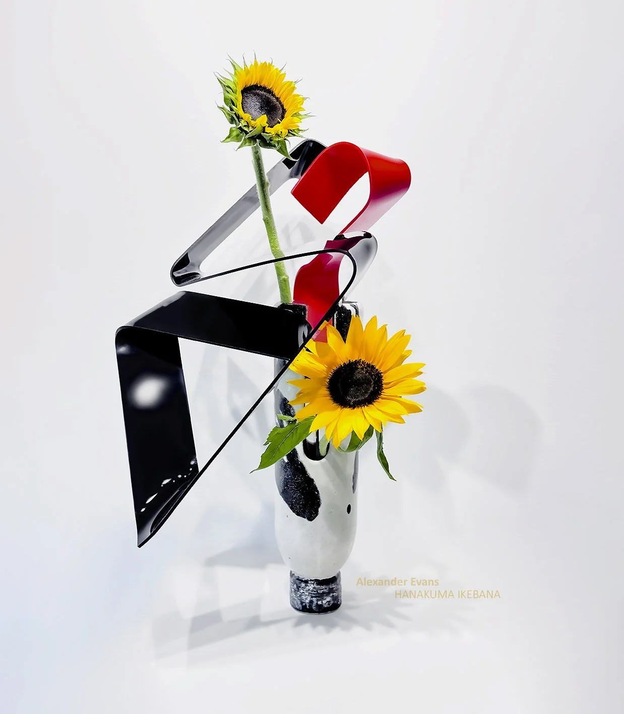 Acrylic and sunflowers in self made container.jpg