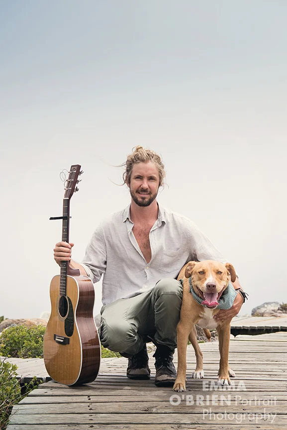 Jeremy Loops and rescue dog Maya photographed on location in cape Town by Emma O'Brien