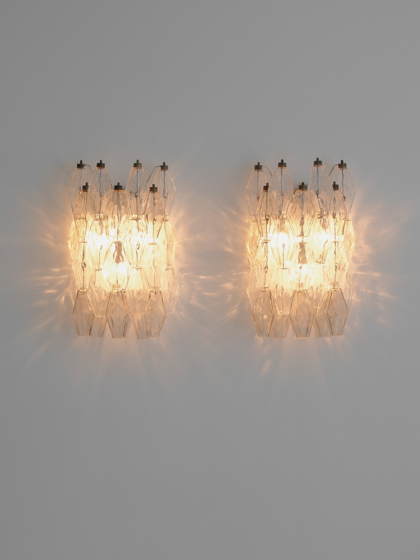 Vintage poliedri wall lamps designed by Carlo Scarpa, manufactured by Venini, Italy, 1950s. Available at Nicolai Hecht. World wide shipping.