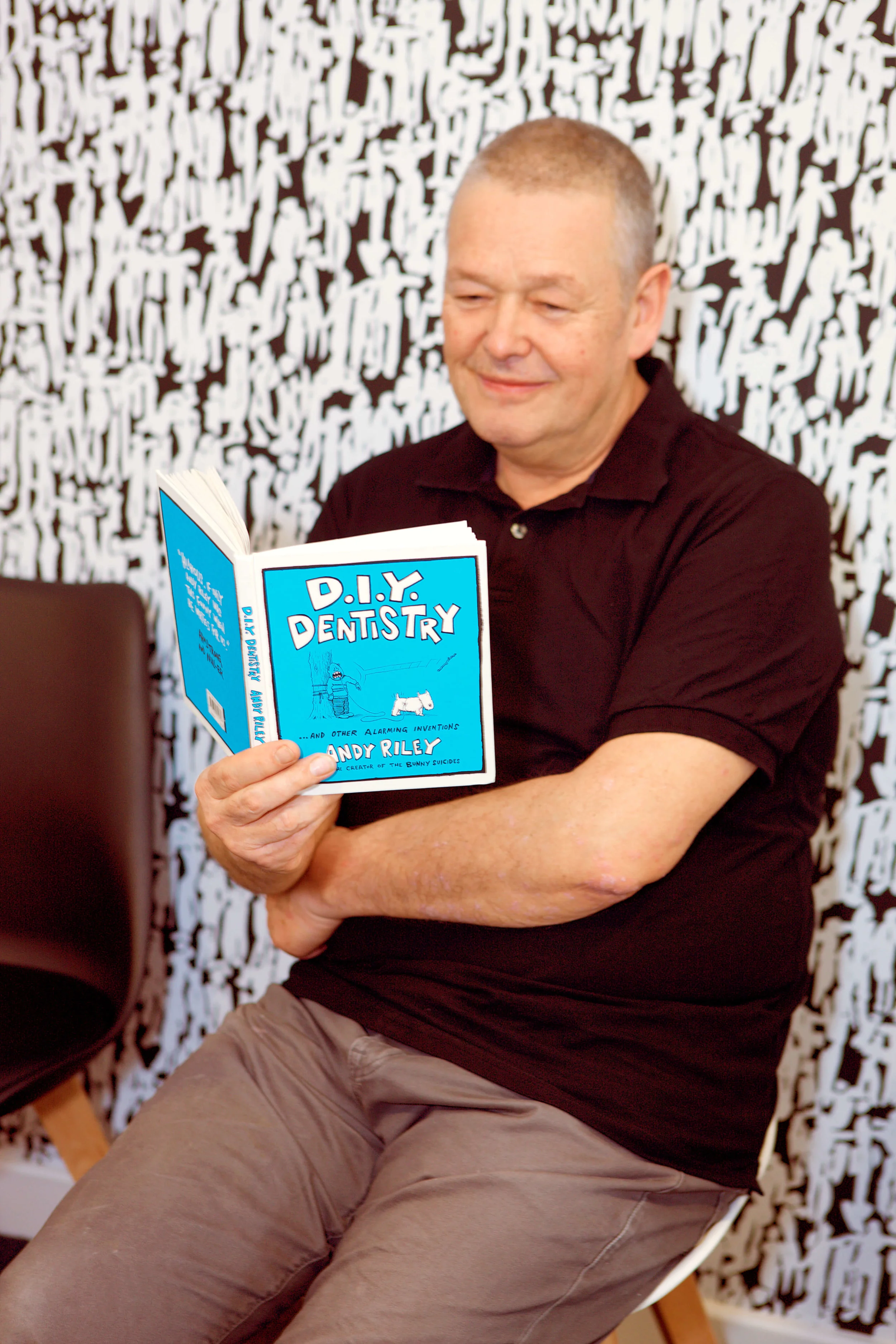 David Vaughan Dental David reading.jpg