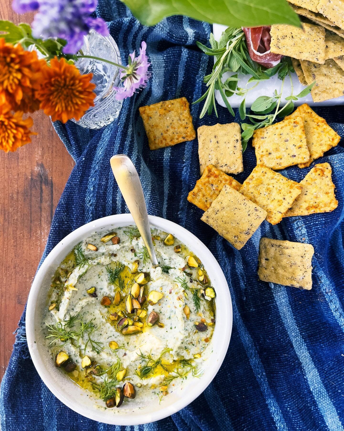 Warmer days call for a springy spread #ad. On that note, I made this smokey eggplant dip, whipped feta hummus, &amp; bright walnut romesco dip to pair with @crunchmastercrackers perfectly crisp new Avocado Toast. These vegan, always gluten-free beaut