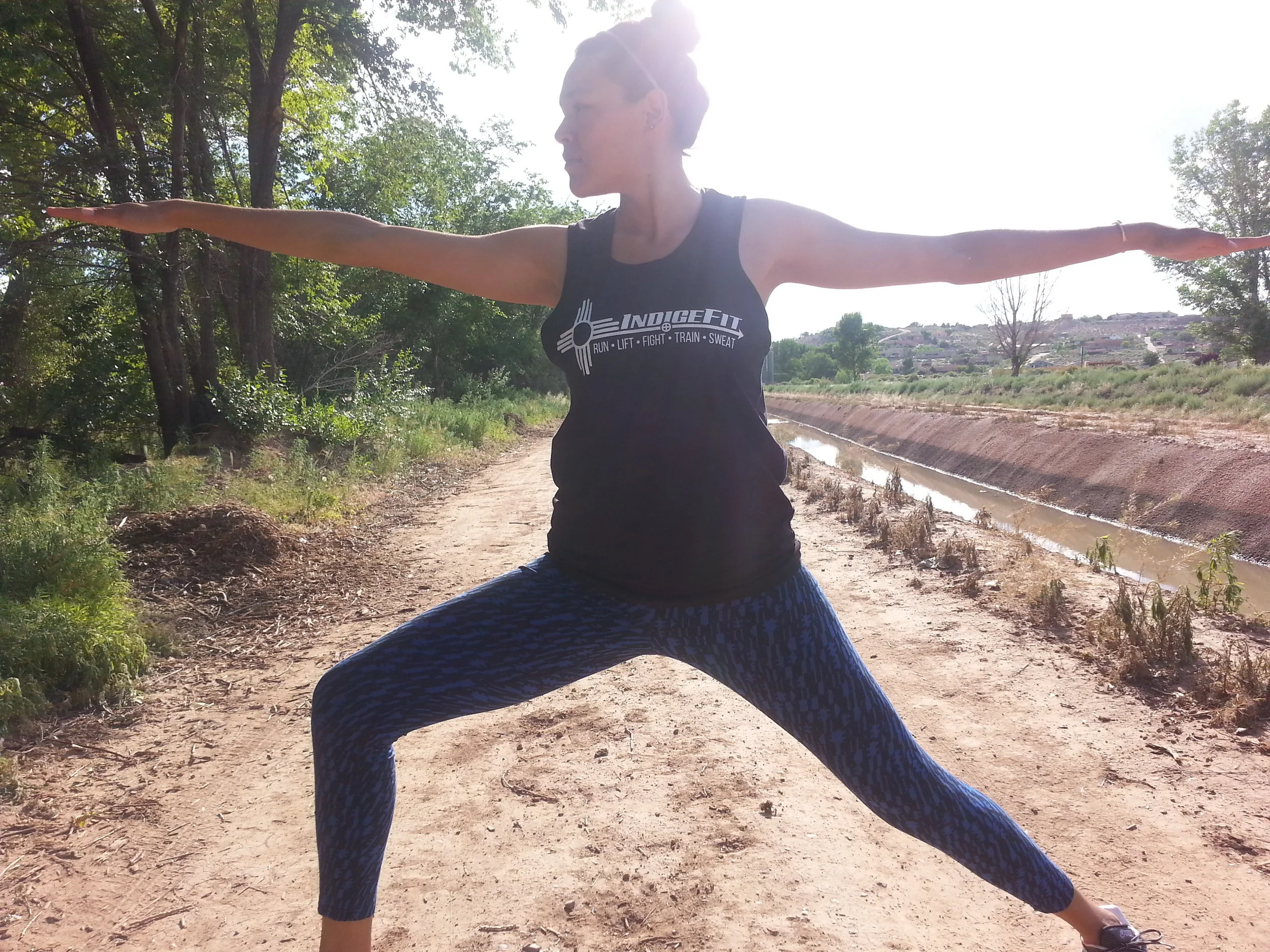 Christine Means doing yoga along the bosque in Albuquerque, NM