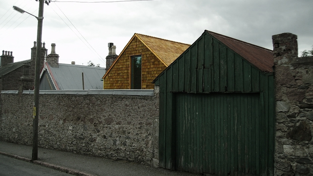 CONTEMPORARY TIMBER FRAME ADDITION TO A CATEGORY B LISTED COTTAGE IN BANCHORY/SCOTLAND