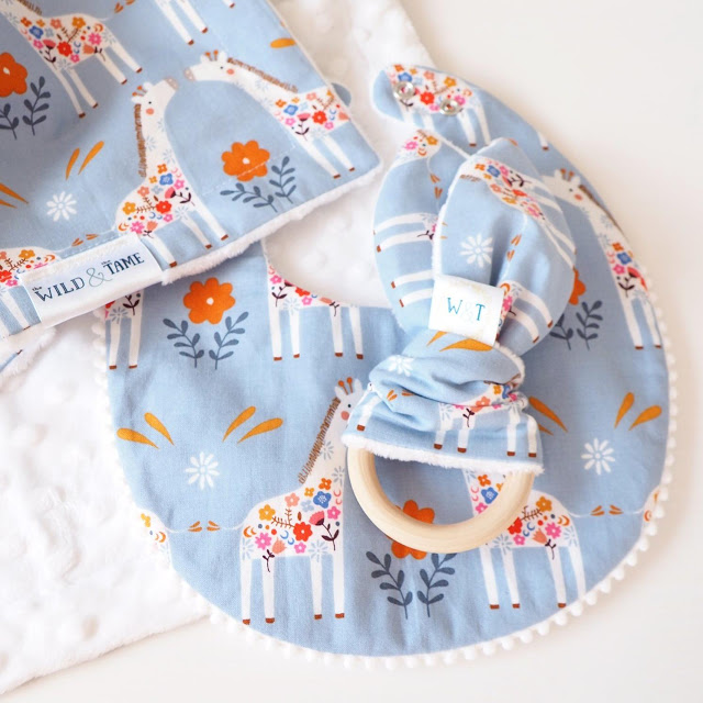 The_Wild_and_The_Tame_Giraffe_Bib_Teething_Ring_and_Moses_Basket_Blanket_1024x1024@2x.jpg
