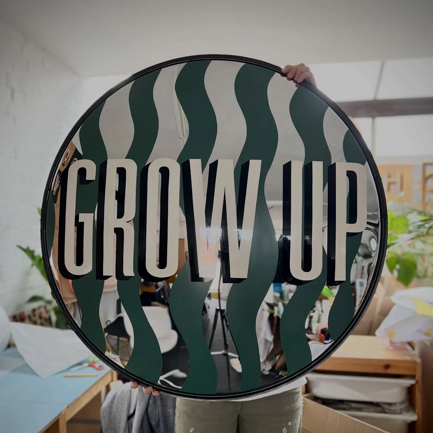 I can&rsquo;t tell you how much I laughed when I thought of this slogan for a garden mirror. Would work equally well as nursery decor. Painted on a scratched mirror, the background shapes were intended to detract from the scuffs, but I love them and 