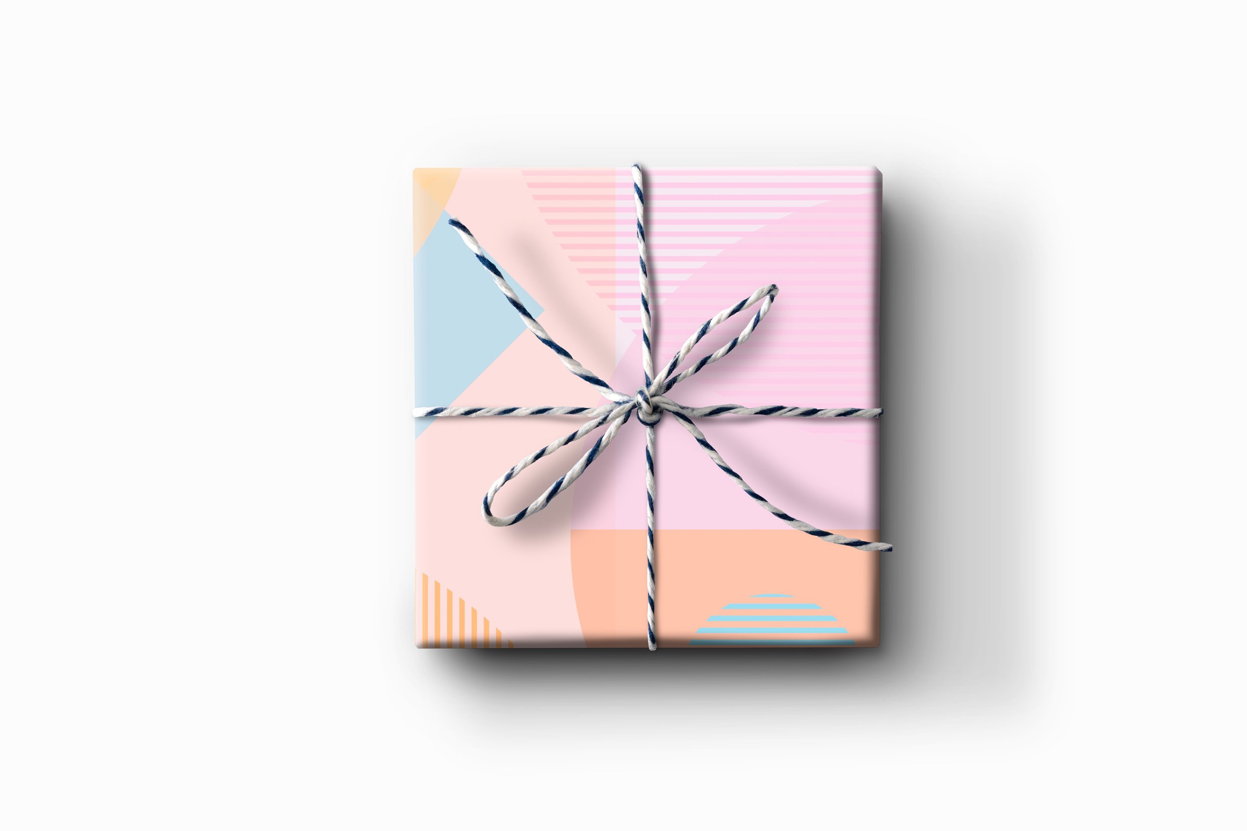 Premium Photo  Small boxes wrapped in solid colored wrapping paper with  matching ribbon