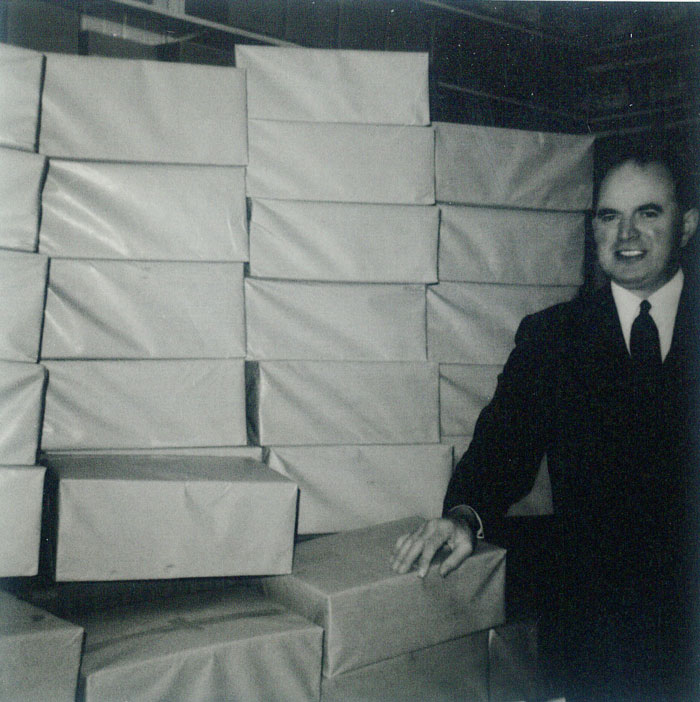 Mr. Allen with literature printed in Outlook Press 1970
