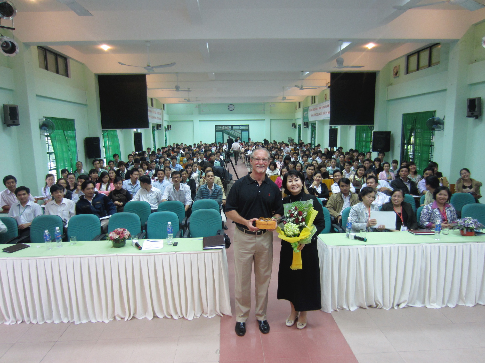 Being given a gift after teaching in Danang in 2014