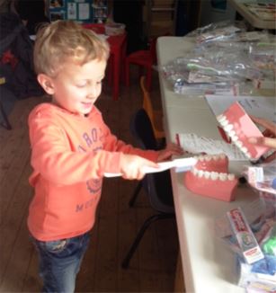 Artie Crozier, of Wagga, learns how to brush your teeth properly at the 2012 Expo.