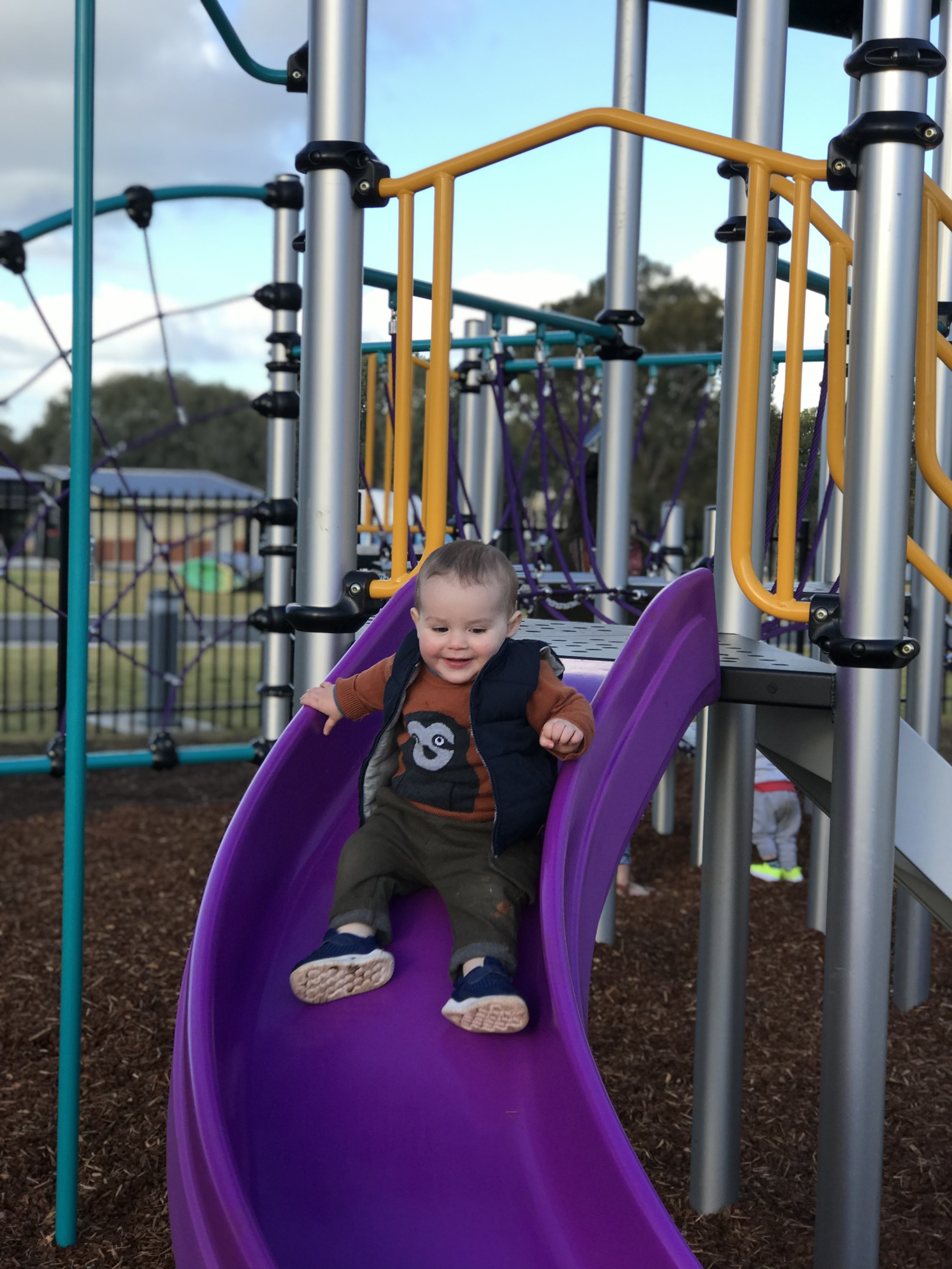 Max on a slide.jpg