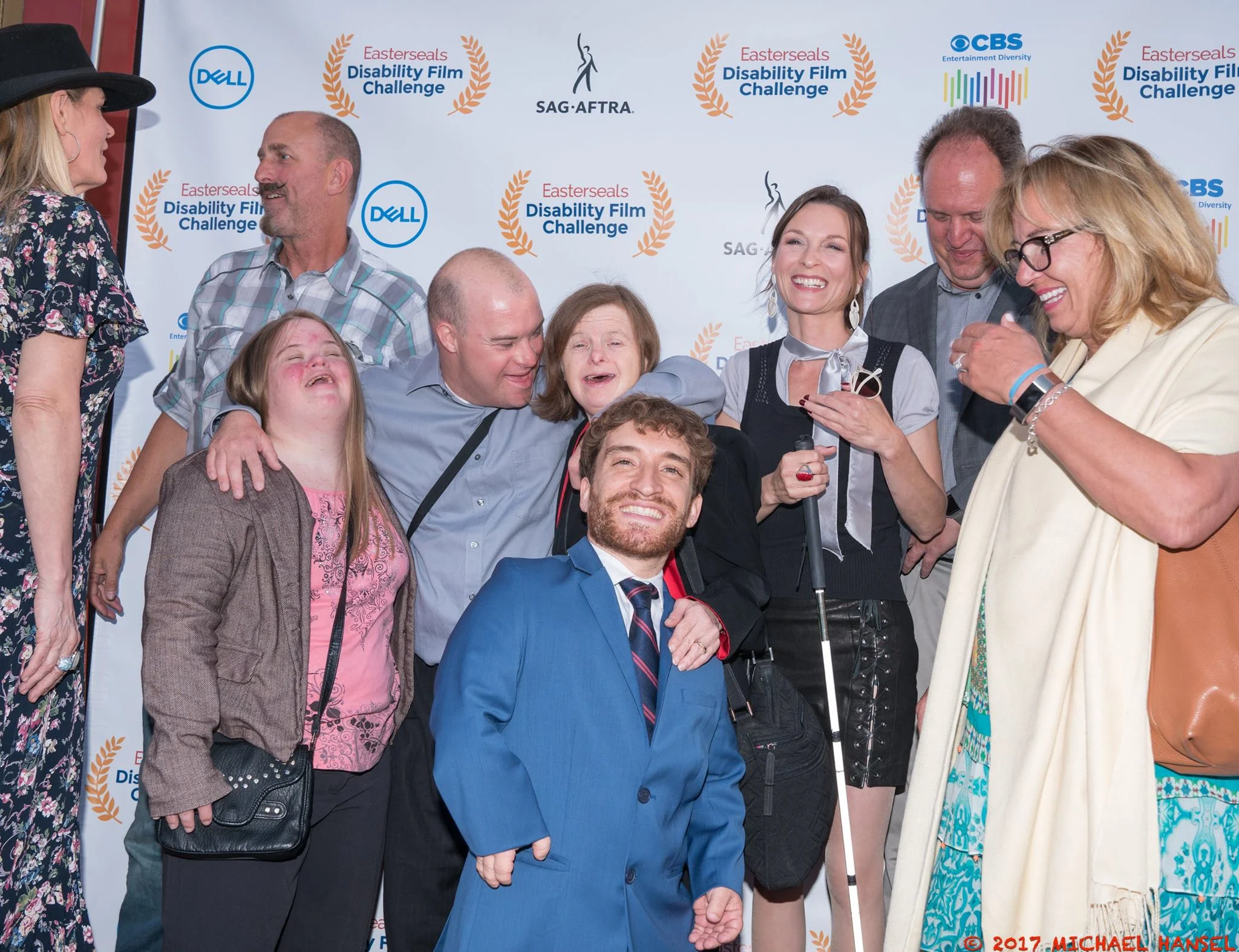 Bella with cast and crew from Whitney's Wedding at an awards show.