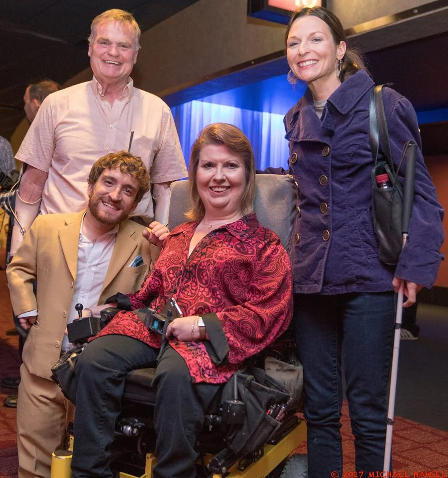 Bella with John Lawson, Nic Novicki, and director Jeannie Gold, at a screening of Jeannie's documentary screening.