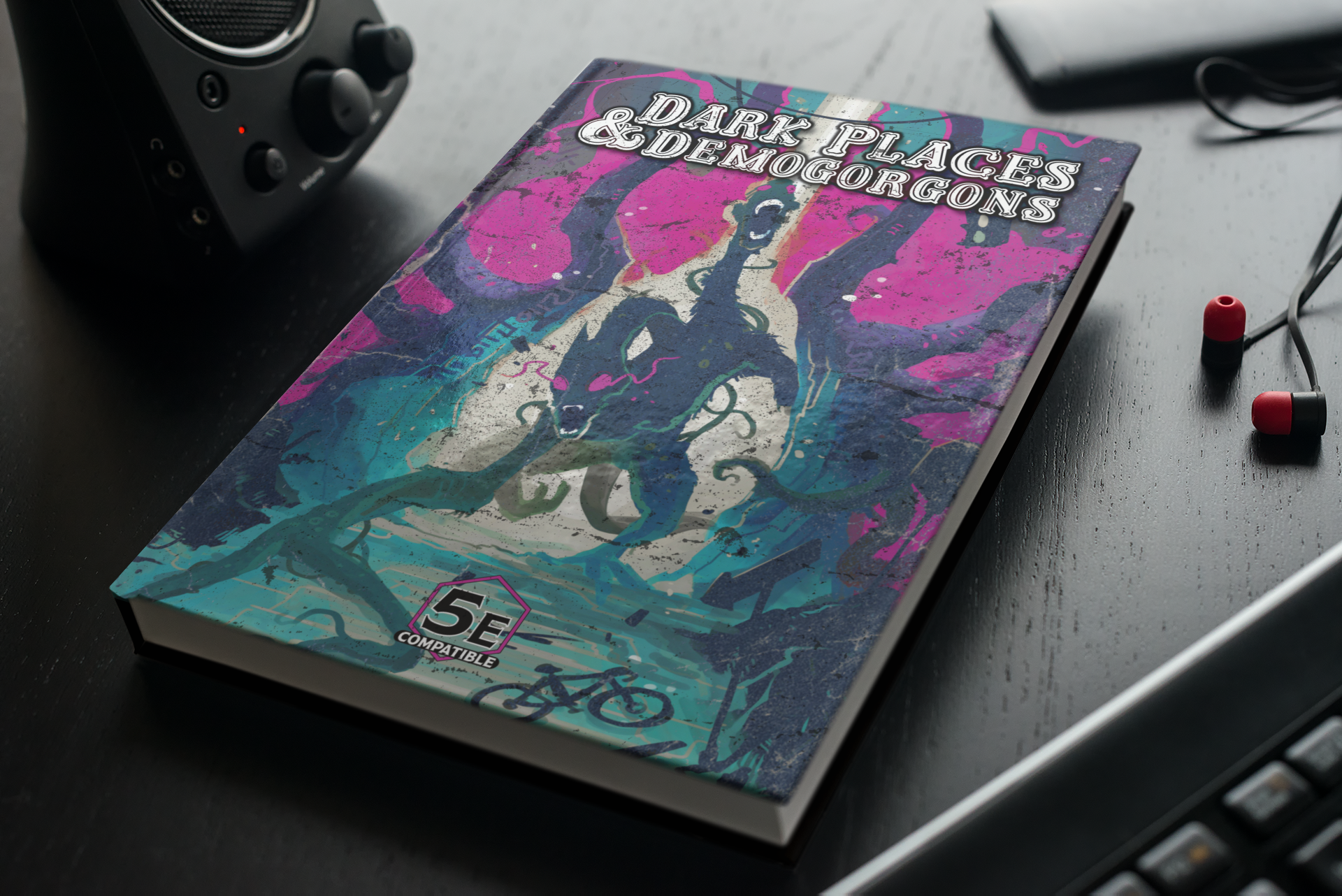 mockup-of-a-hard-cover-book-on-a-table-with-gadgets-3407-el1.png