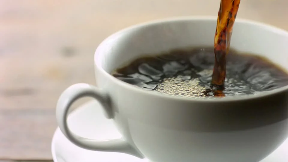 386523652-hot-beverage-coffee-cup-mug-pouring-out.jpg