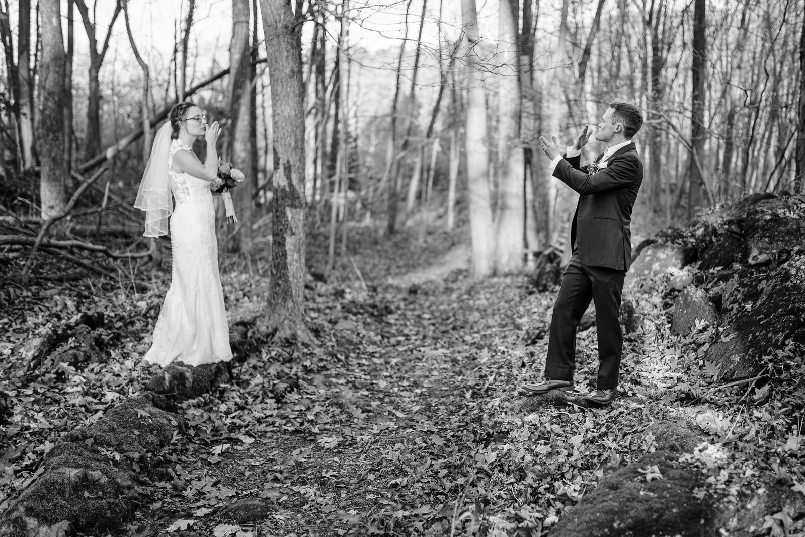 Newlyweds blowing kisses to each other in Newton NJ