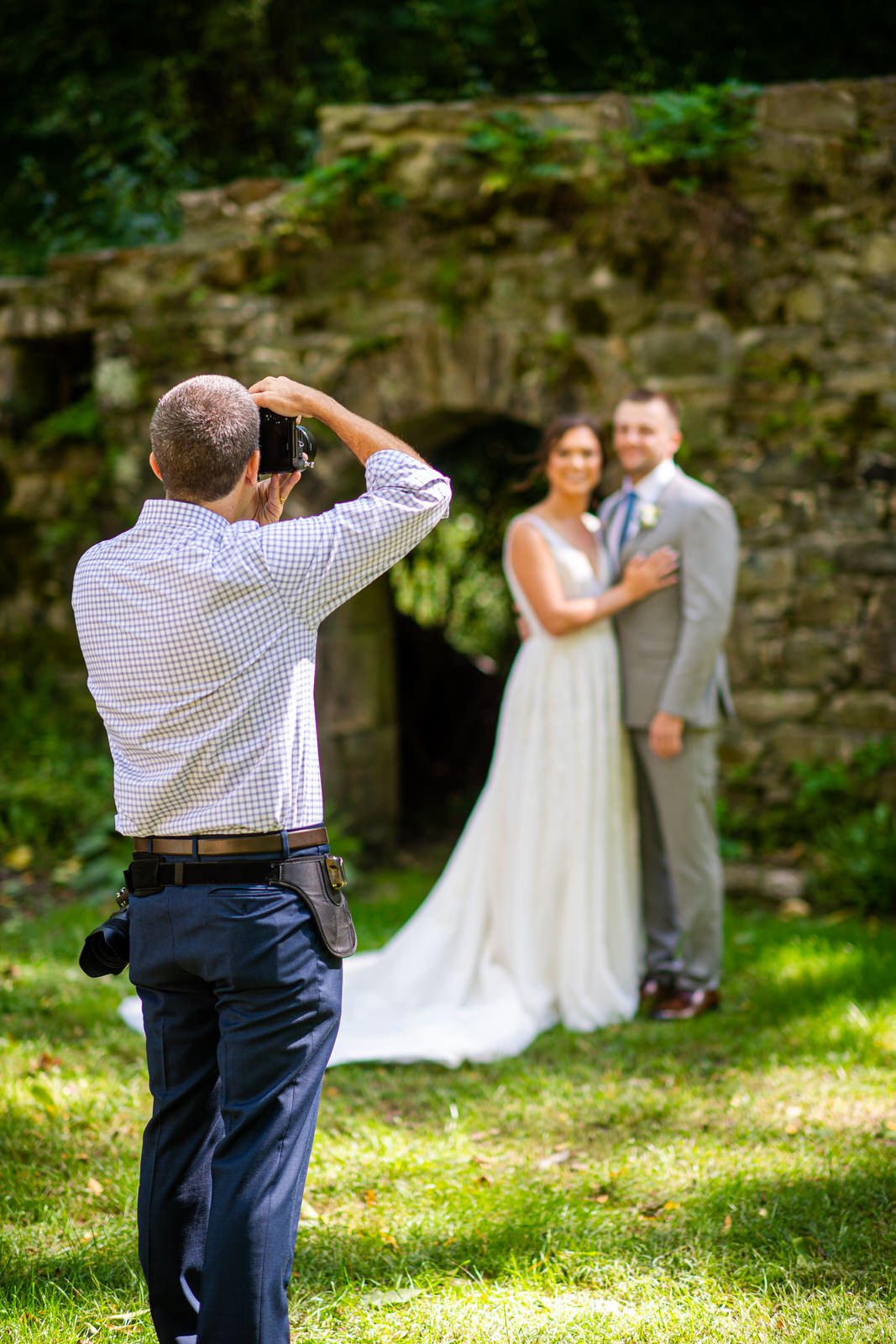 Colin Hayden Photo taking a picture of a newlywed couple before the ceremony in Elizabethtown PA