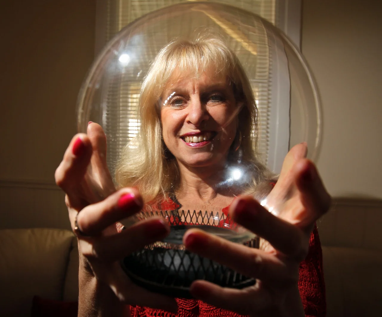 How to photograph the supernatural
It’s not everyday you get to photograph a medium.
On arrival, I half expected to meet a mysterious woman cloaked in silk, smoke and mirrors, surrounded by all sorts of spiritual gadgets.
Instead, I ended up in a typical lounge/dining room, with okay window light, a couple of small crystal balls and a down-to-earth person called Val.
It felt exactly like a thousand other photo shoots, with a thousand other people — except this time, she could talk to dead people.
Cool, huh!
Expecting a fascinating answer, I asked Val what she saw when she gazed into the crystal balls.
“Nothing,” she responded.
Uh-huh?
“Your boss asked if I had one because it would look good in the photo, but I don’t actually use one when I’m working.”
She went on to say, that there were mediums who used tools, and there were mediums who didn’t — just like there were photographers who used a lot of gear, and others who only brought along the bare essentials.
As I was standing there with only a camera and a 16-33mm lens around my neck and one flash in my pocket, I could see what she was getting at.
So, while Val got to work polishing a crystal ball, I scouted for a location.
Outside? I saw it on the way in … nothing jumped out at me.
Inside? It was a house with bedrooms … nothing that screamed “supernatural”.
But there was a nice window, which was something.
Val hopped in front, and I underexposed the scene until the window looked nice.
Then, holding my flash in my left hand, I moved it high on camera left and got Val to tell me when the face of the flash (the bit where the light comes out) was pointed at her. The flash was in manual mode, set on a mild output. If it lit Val’s face too brightly, I could shrink my aperture (by choosing a larger f number) to tone it down. If that in turn made the background too dark, I could slow my shutter speed to let more ambient light in.
Remember: Your aperture dial is like a volume knob for your flash, and your shutter dial controls the ambient (non-flash) light in the photo.
It took a bit of wiggling with the camera to keep the white hot-spots off Val’s eyes in the picture, but once we found the right spot through trial and error, it wasn’t long before we arrived at a photo we liked.
Like it? Dislike it? Let me know in the comments, please, and don’t be afraid to ask me anything !
Shot for The Border Mail .
Cheers, Ben.