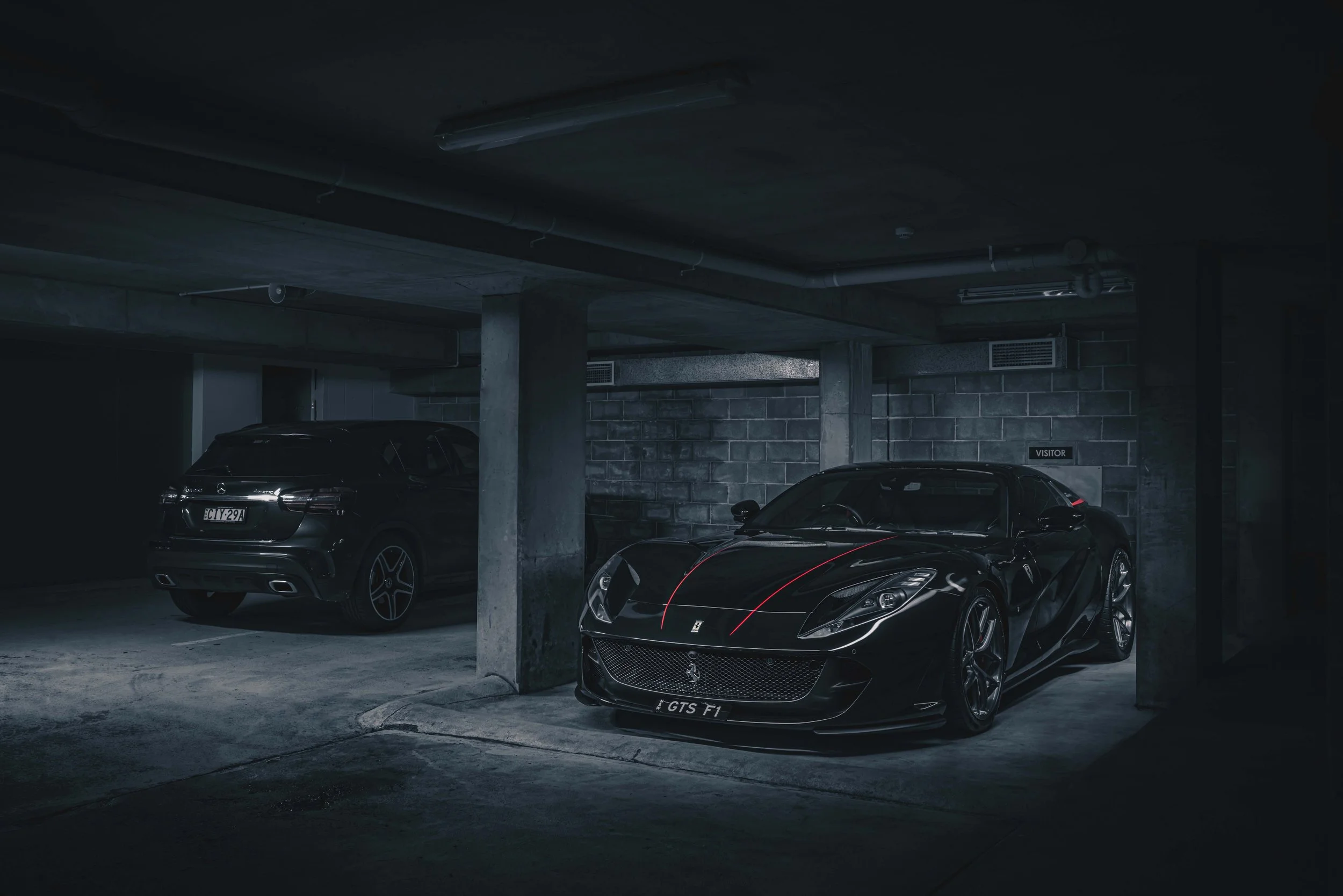 Glossy black Ferrari 812 GTS parked in a Rose Bay after a complete mini detail package. Mobile car wash servicing Rose Bay / Macquarie Park by Shibbi Automotive Care.