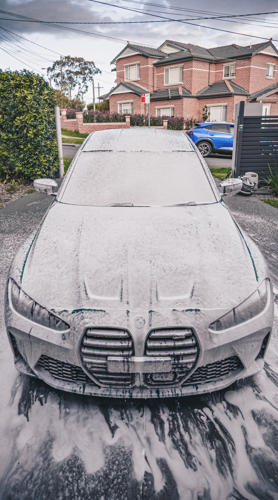 	
Shibbi Car Detail mobile car detailing completed a full exterior detail on this green BMW M3 G80 including paint correction and ceramic coating, resulting in a deep wet mirror gloss in a customer's driveway in Rose Bay, Sydney.