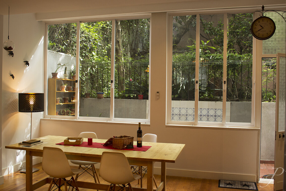 apartment-living-room-lisbon-city-luxe-natural-light-windows-door.jpg