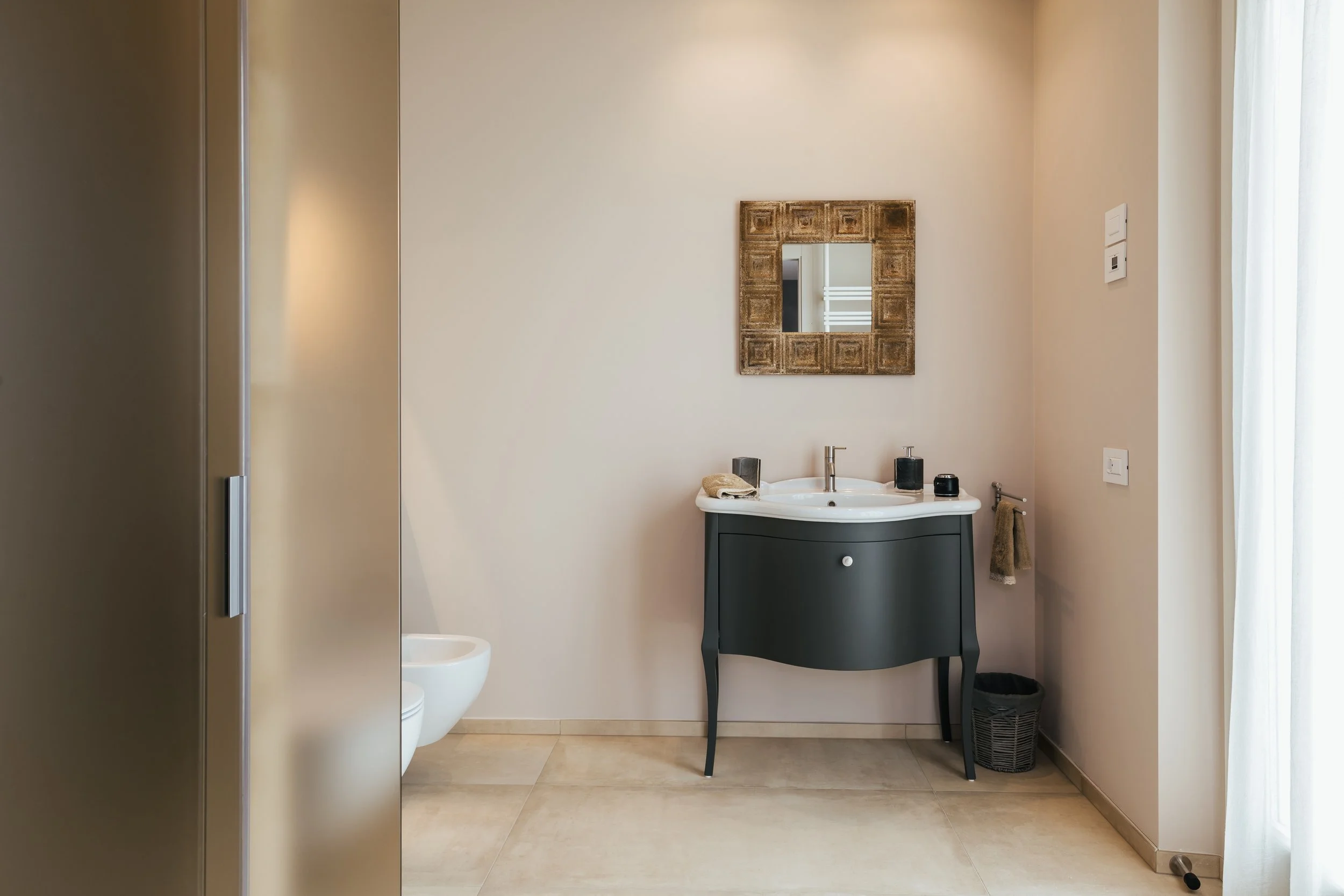 Bedroom 2 bathroom & sink_Villa Olivo_Photo credit Andrea Volpini copy.jpeg