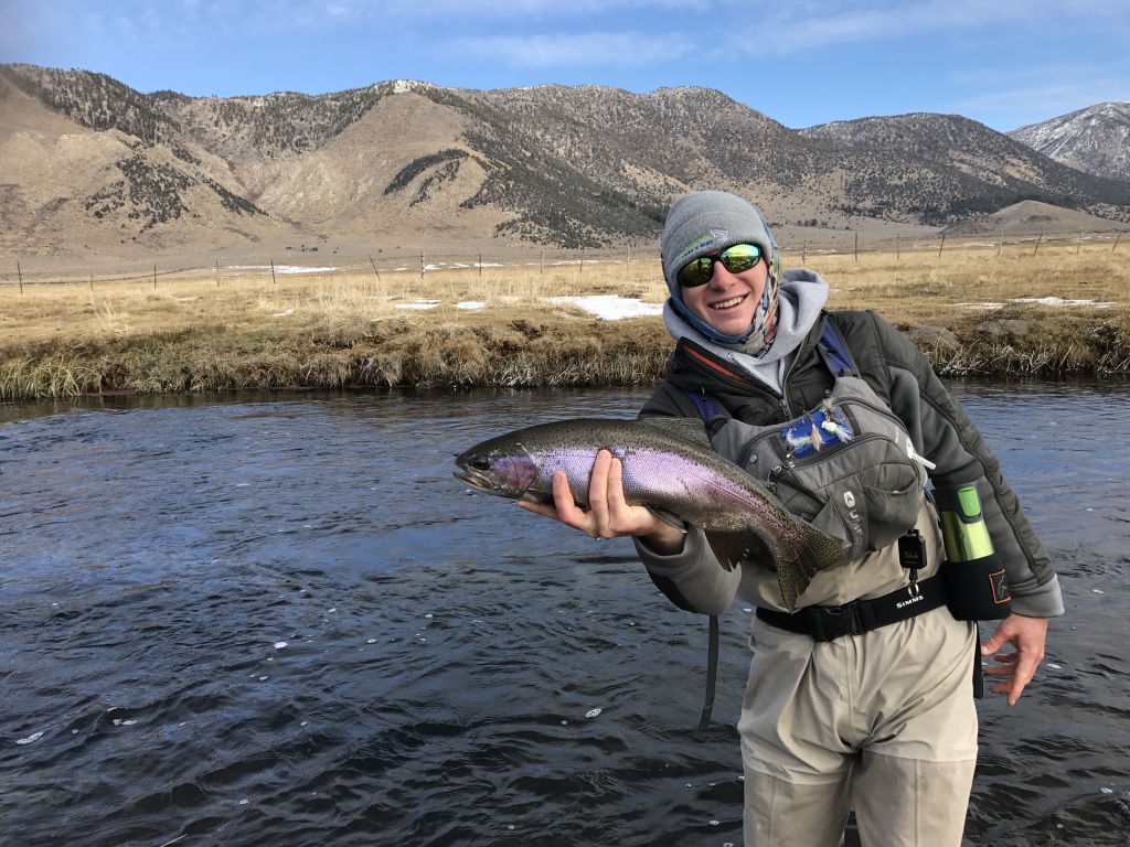 Wyoming fishing guide Ardie Wagoner holds a typical upper Owens River migrating winter rainbow trout.