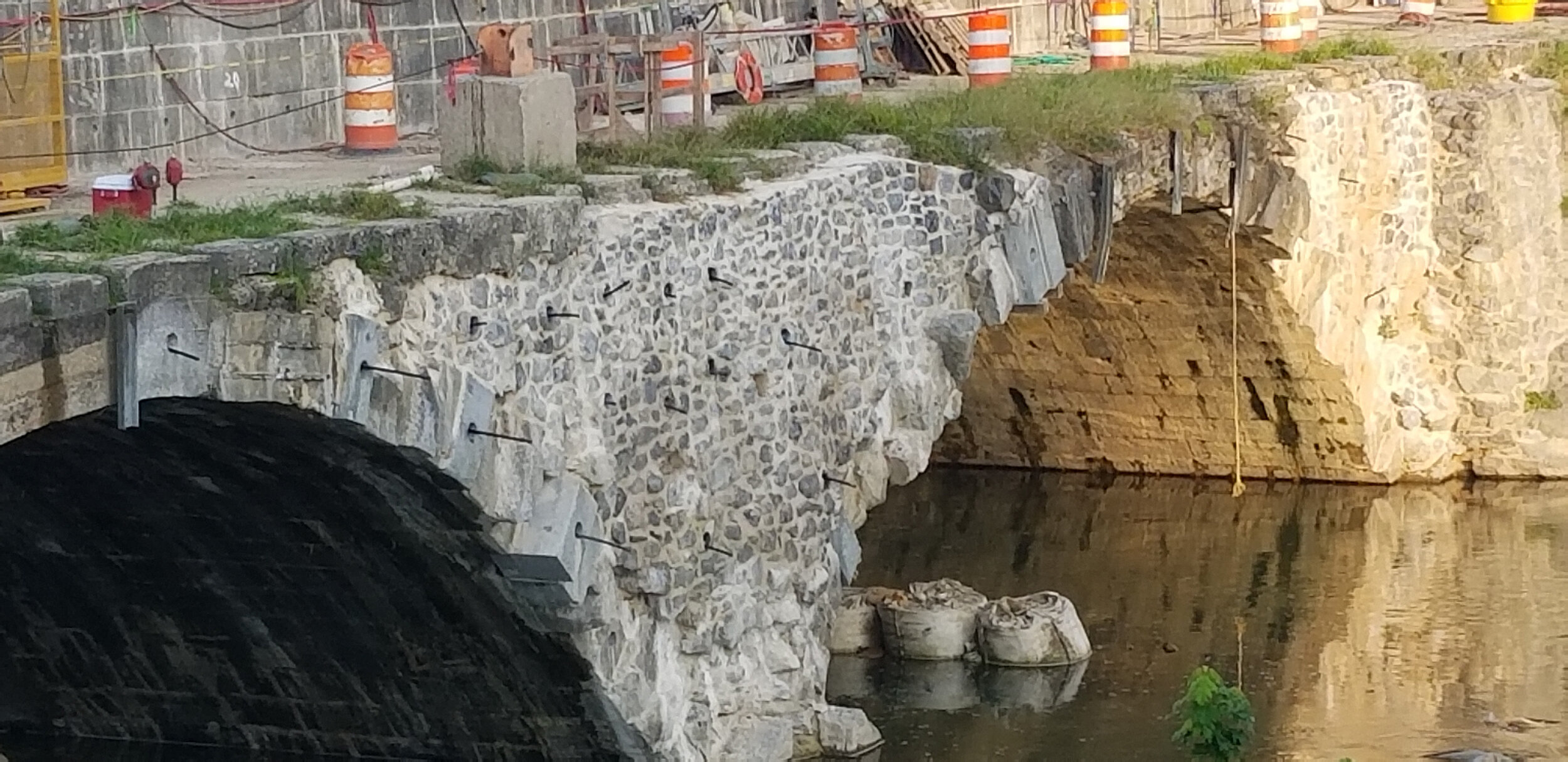 During: Aqueduct Berm Side Extruding Pins Installed Through Stones for Shoring Mitigation