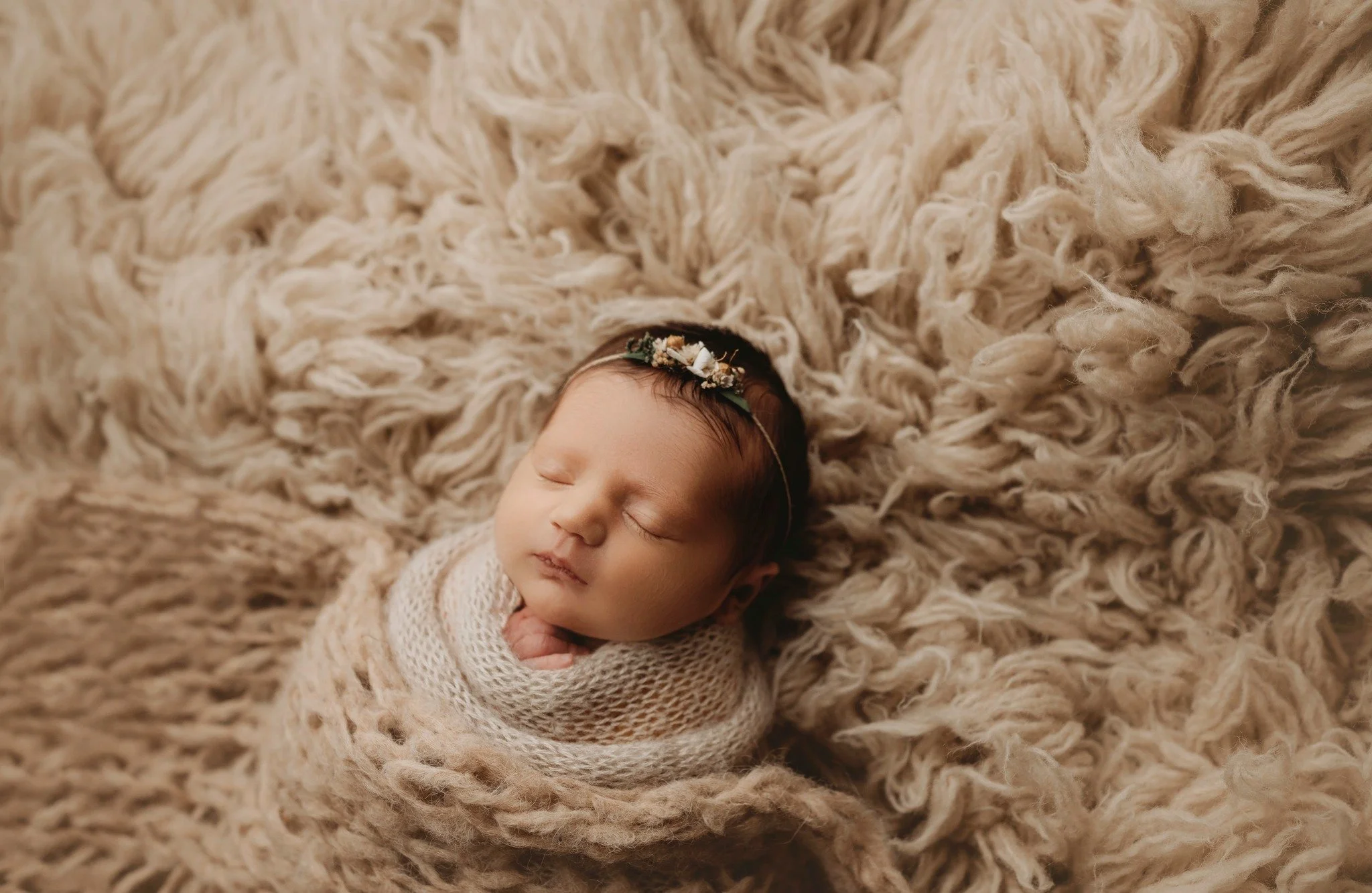 We LOVE all the baby snuggles. Newborn sessions take 2-4 hours. Some are surprised by this but we don't want to rush any session. We are on baby's time. Between changing, soothing, feeding, and taking breaks. If your little one isn't sleepy, don't wo