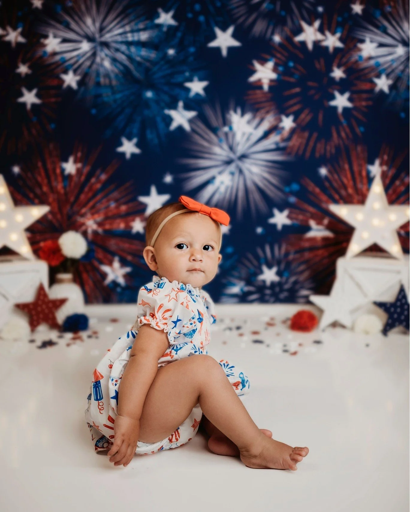 The cutest little firecracker! I love when babies scoot but they have one leg up. It's the cutest but funniest thing EVER. 

www.krisitnabanksphotography.org