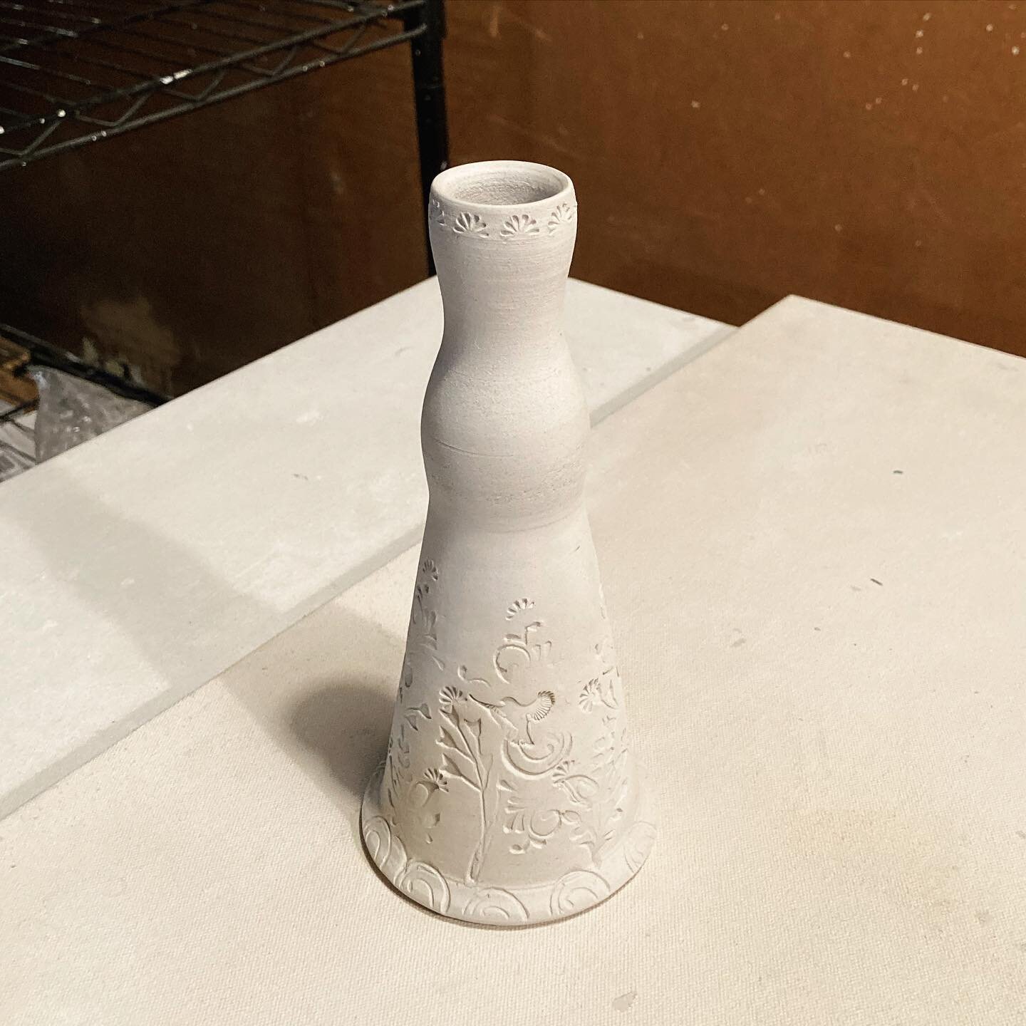 I&rsquo;m working out some #candlestick forms, my funky garage taking on some Rembrandt-esque qualities in this light. My favorite part of winter is the light it forces us to create. 🕯️ #ceramics #ceramic #interiordecor #handmadeceramics #wheelthrow
