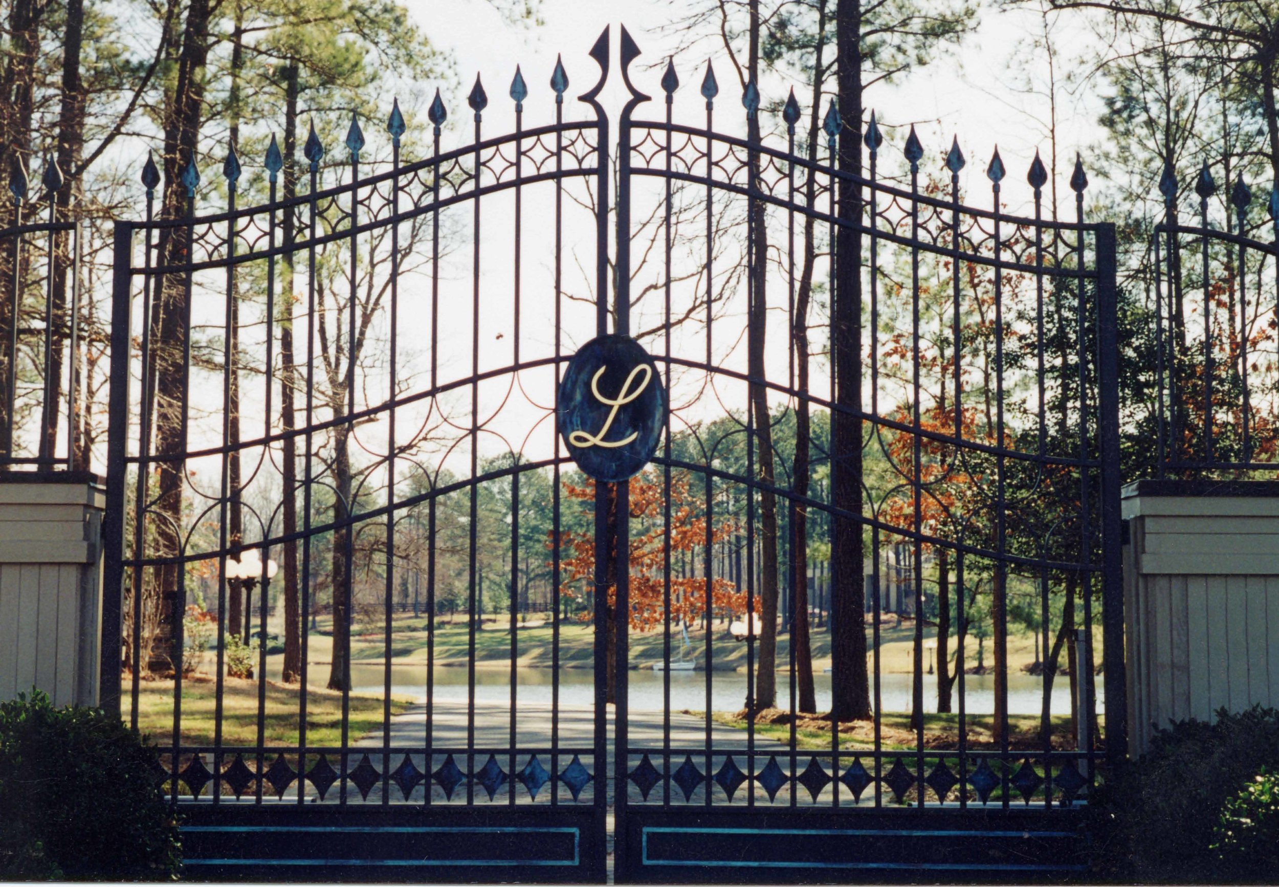 driveway gate with copper accent