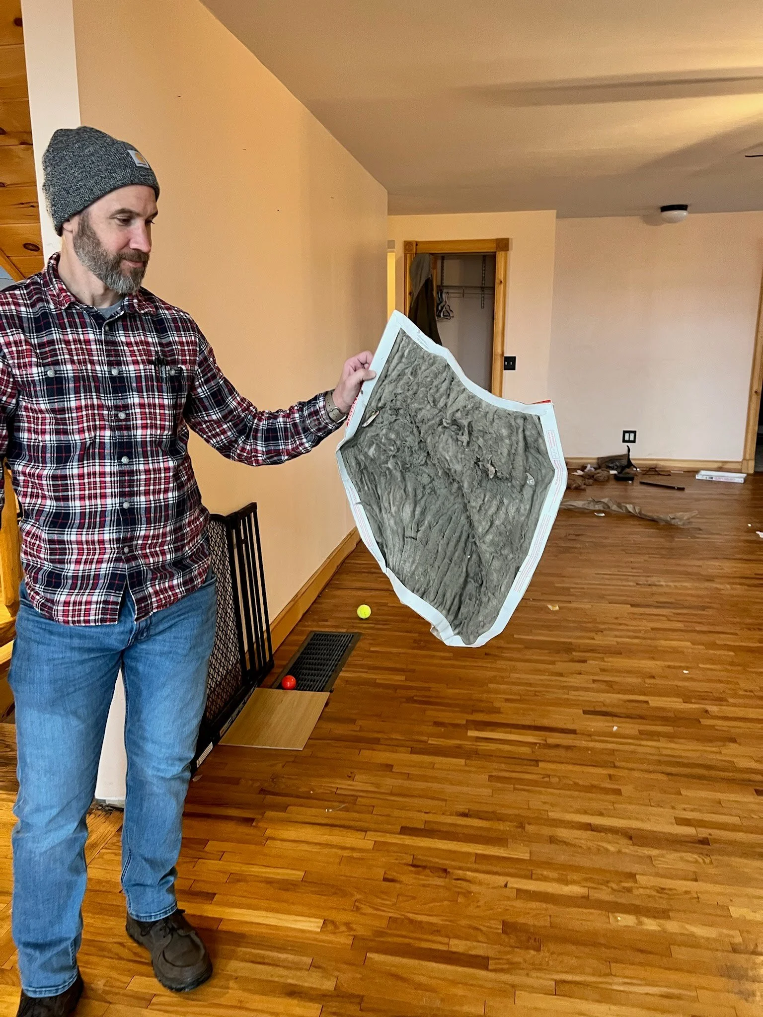 Man holding a Dirty Furnace Filter