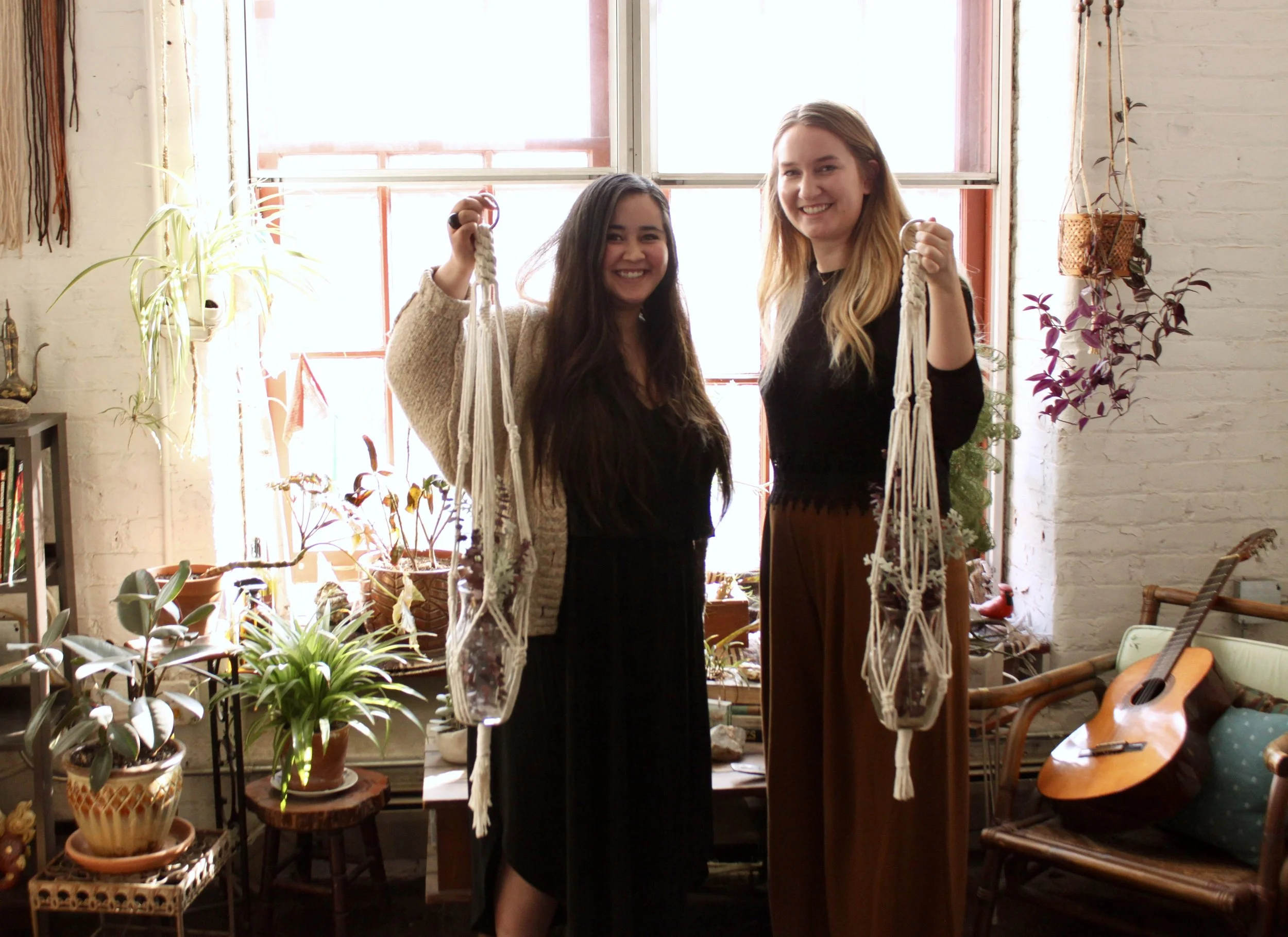 Melia + Emily with their finished plant hangers.
