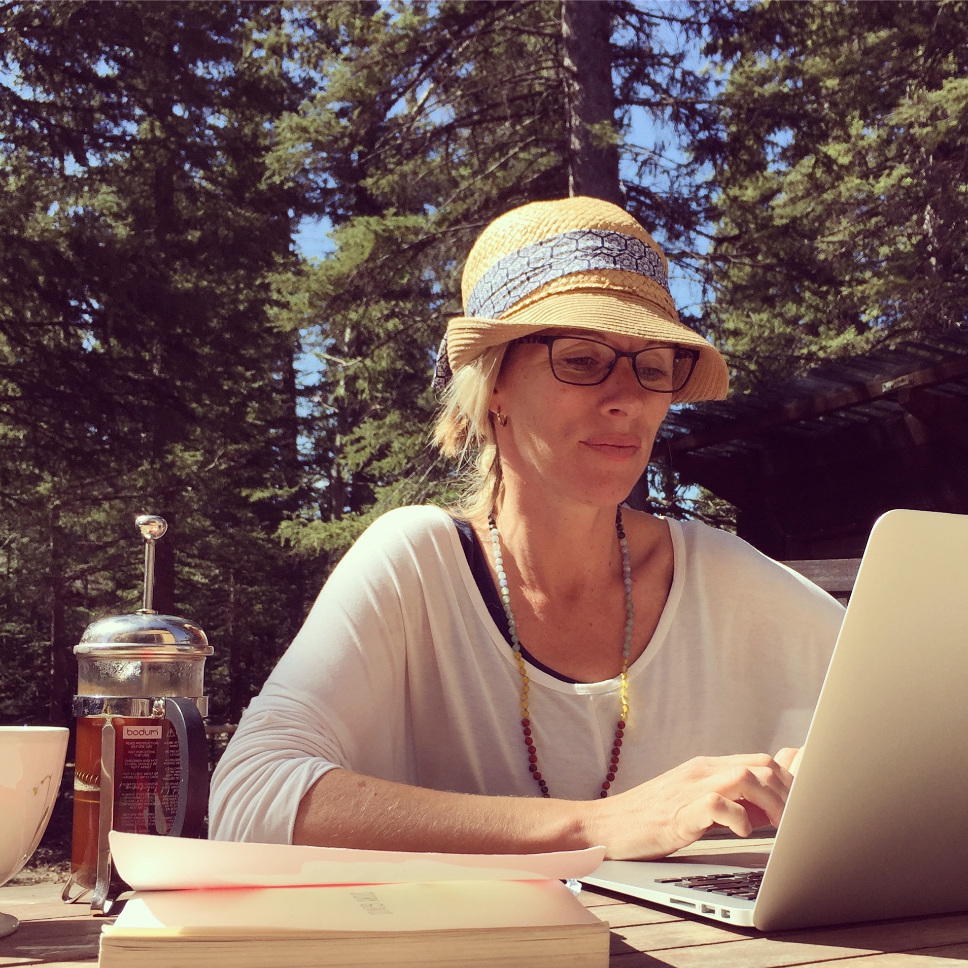 The crisp fresh air of the rocky mountain foothills is incredible. This was late May. Warmth had found its way to my deck. When the kids were at school this was my favourite writing spot. Surrounded by chirping parrot like evening grosbeaks, squirrels and the heady scent of pine trees. It was a good place to write.