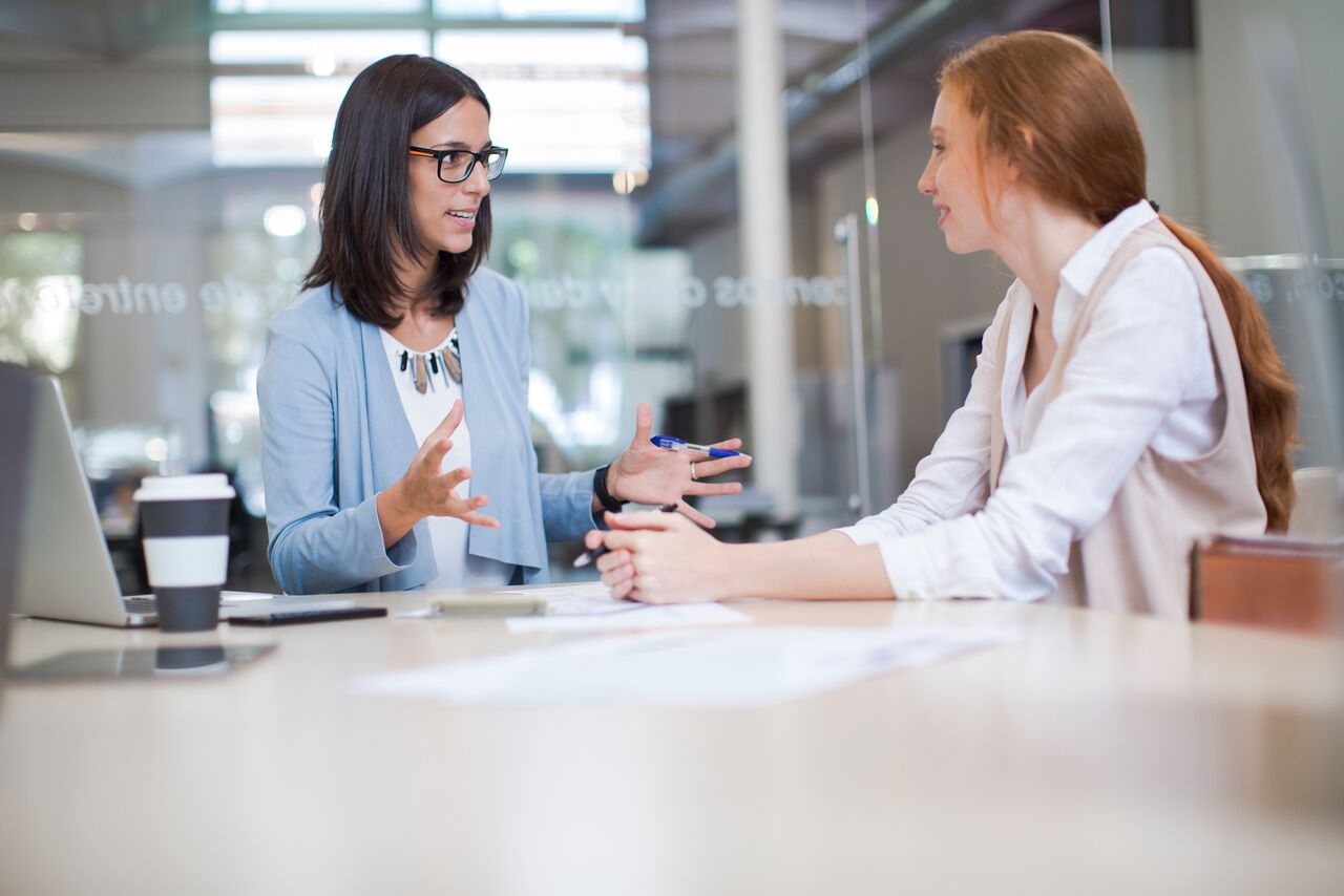 Coaching-and-advise,-two-business-woman-working-together.-613777524_4000x2667_preview.jpeg
