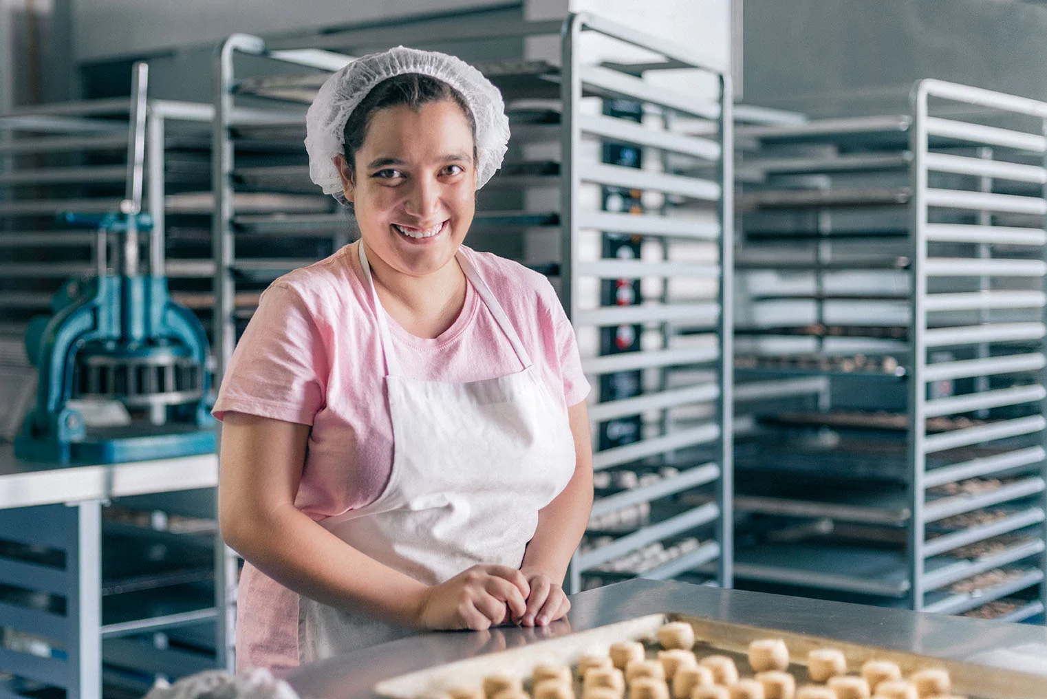 Volunteer-with-intelectual-disability-working-at-Bakery-Workshop-594475880_6343x4233-72dpi.jpg