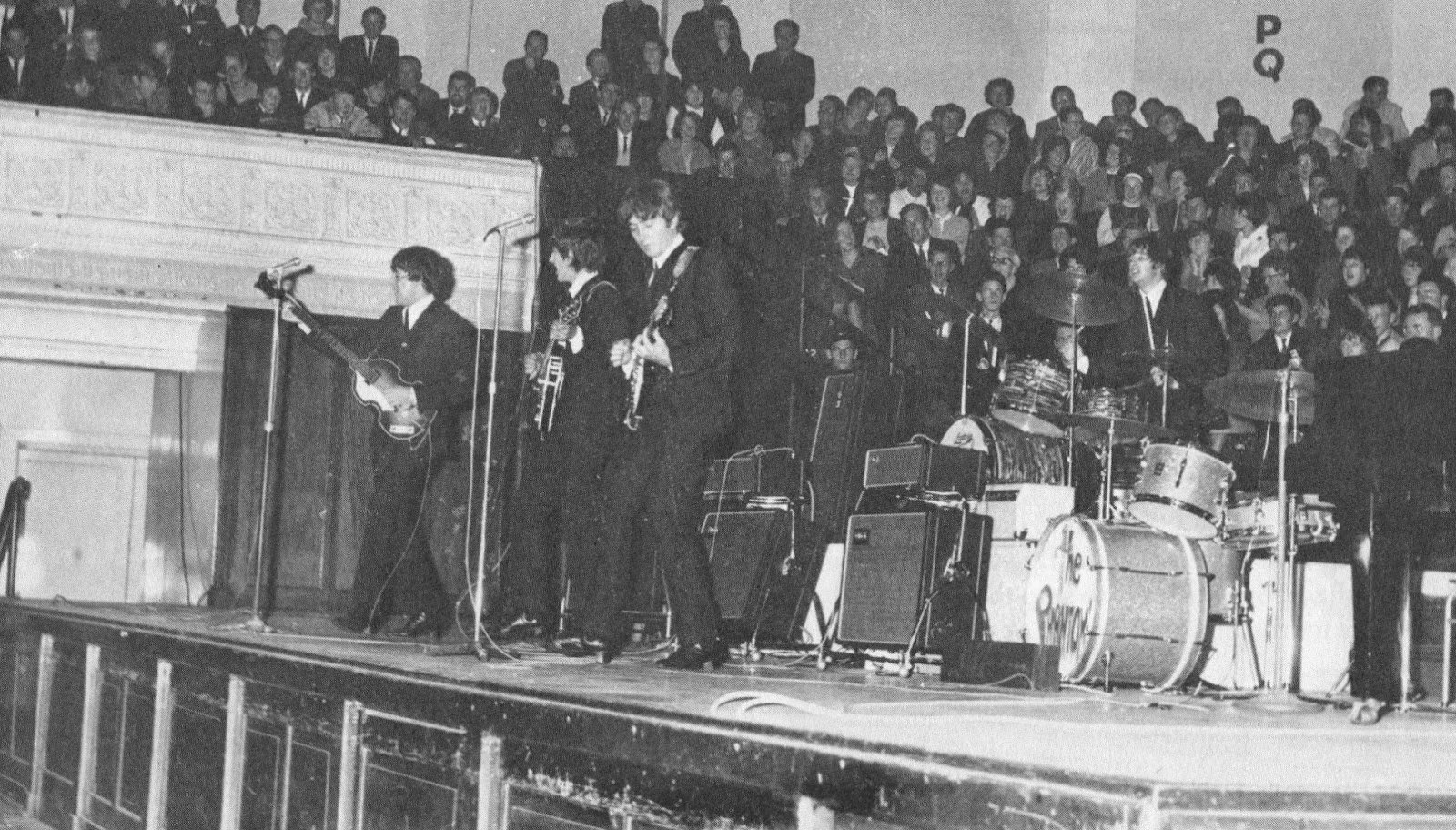 The Beatles performing in the Town Hall, 1964