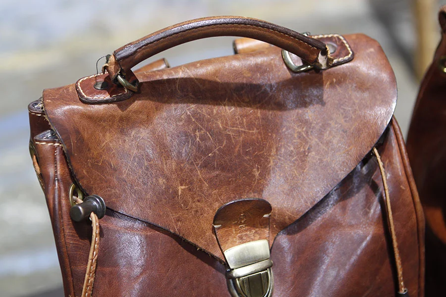 Only 8 months old & quite weathered. I was told she was used everyday & one of its handle came loose.