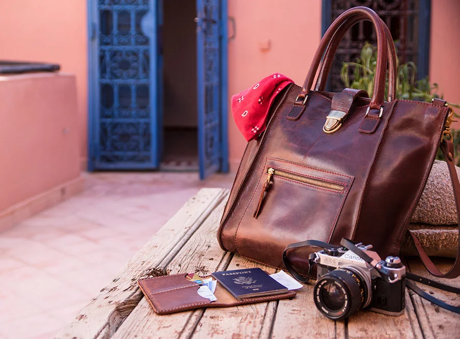 My daily grab-and-go items, loaded up my Karl with some camera stuff, and water bottle with some room left-over for trinkets and my passport with cash. The tote is perfect for Morocco, big enough to fill with treasures from the shops and markets, but tight against the body and secure enough to avert pickpockets. Photo Taken atop the rooftop terrace at my friends house in Marrakesh.