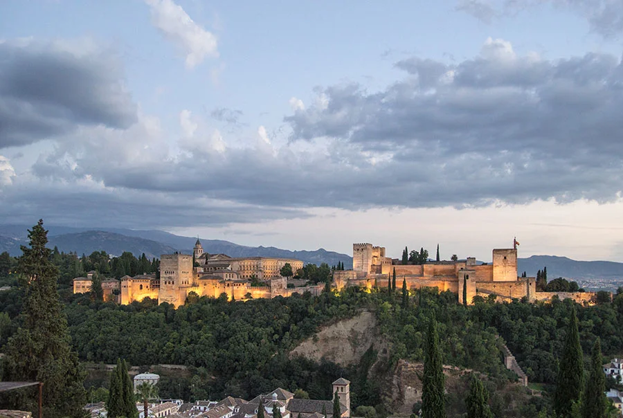 The Palace of Alhambra is one of the northern outposts of the Moorish Empire and the Moroccan-Arabic people that inhabited Andalusia, modern day Spain. The palace and fort include a blend of Classical Spanish and Moorish architecture, perched atop a hill at the base of the original Sierra Nevada mountains. The scale and size of the palace are absolutely marvelous from the prominent bluff, unobstructed vistas of Granada and the entire region.