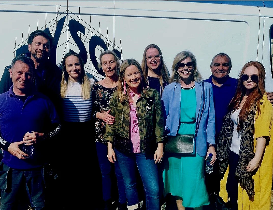 Kay with Sophie Robinson and the DIY SOS team