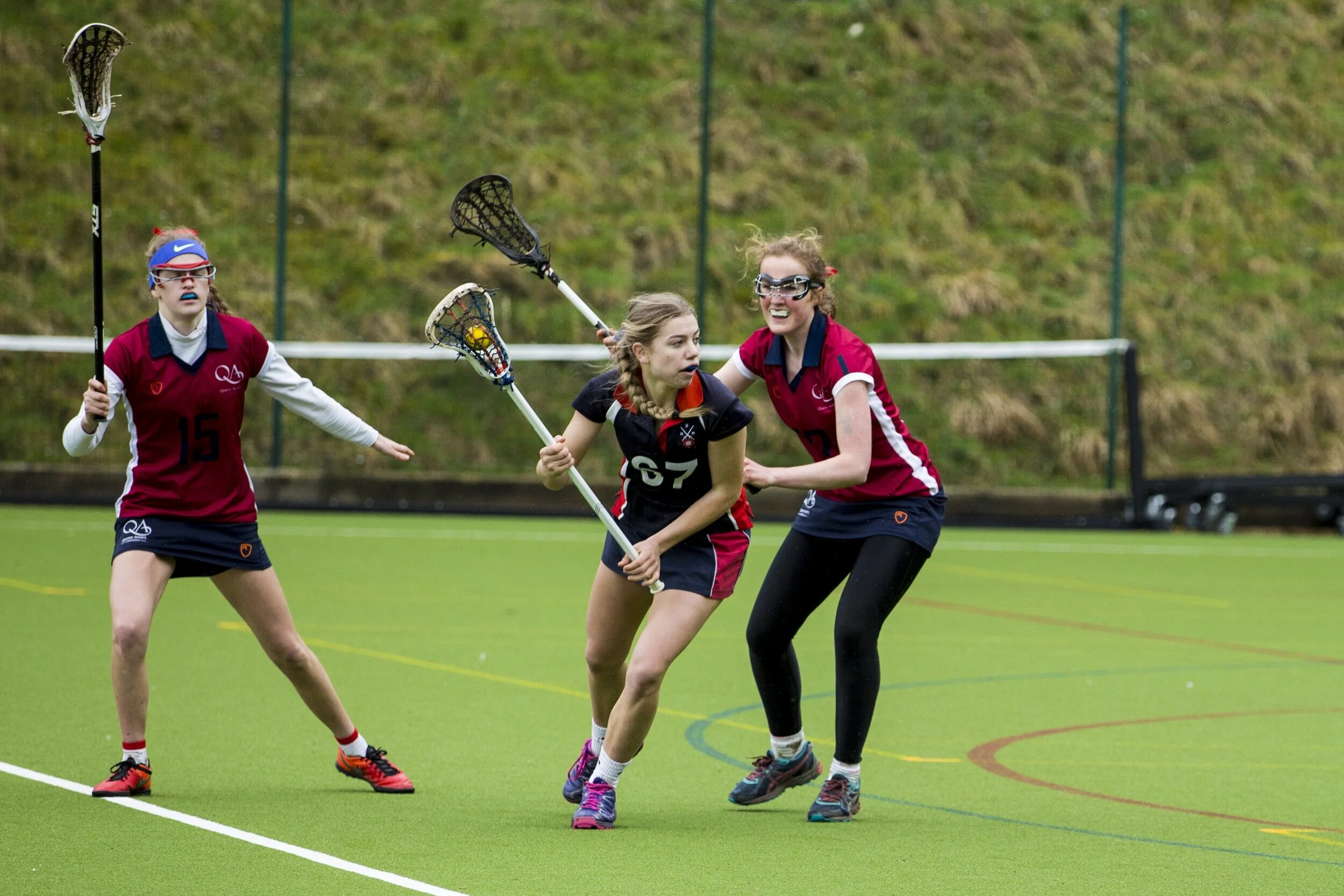 Girls playing lacrosse