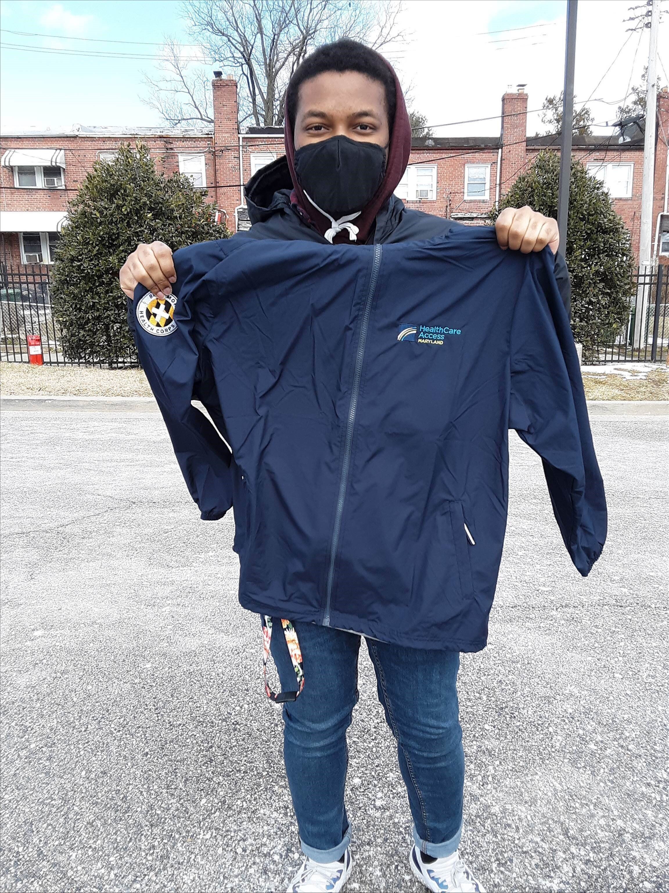 Showing off new Baltimore Health Corps swag