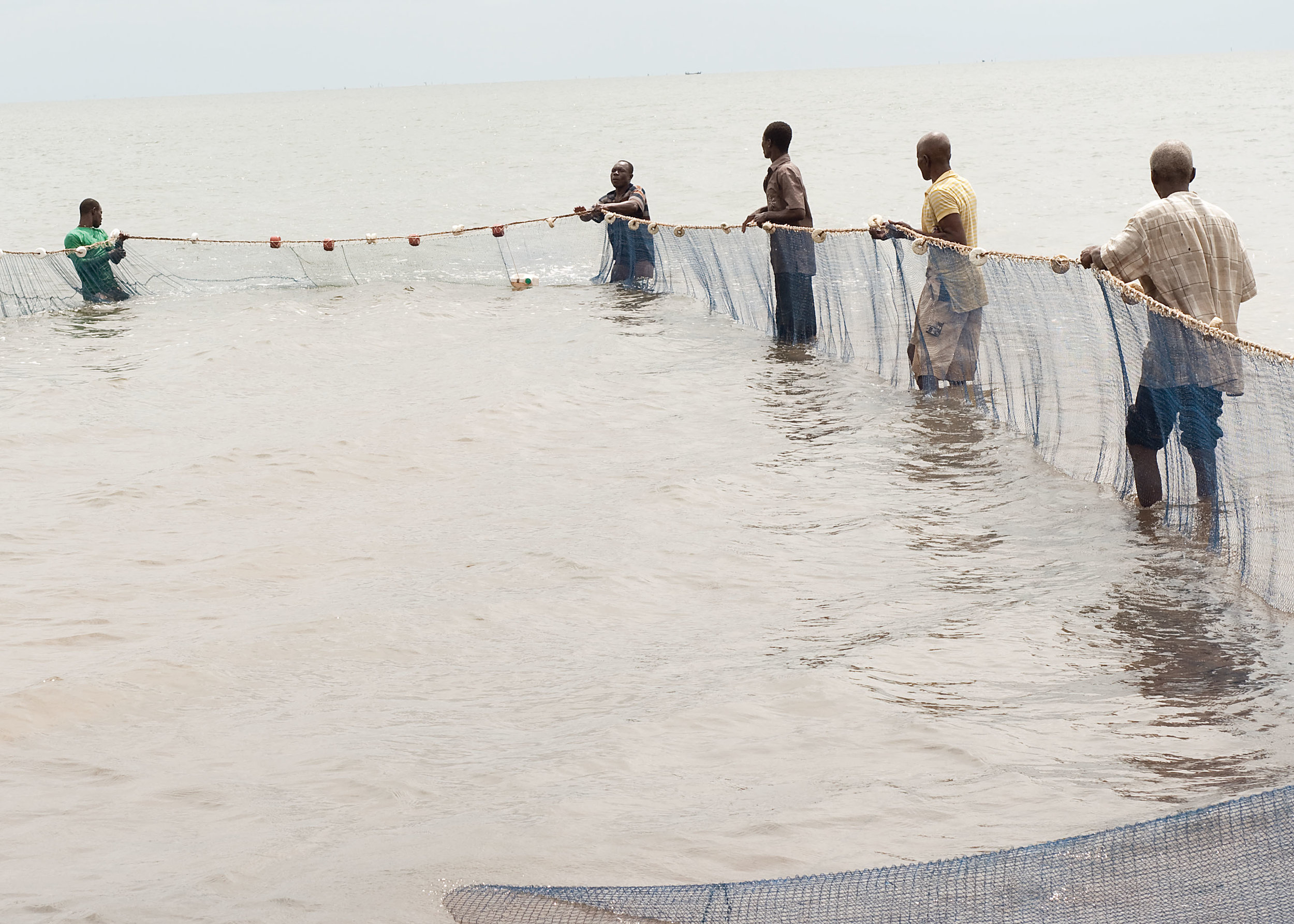  village fishermen pulling in nets 