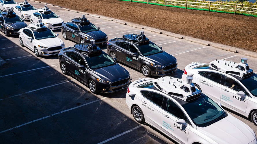 Pilot models of the Uber self-driving car is displayed at the Uber Advanced Technologies Center on Sept. 13, 2016.