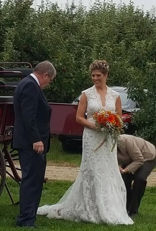 off the carriage with dad.jpg