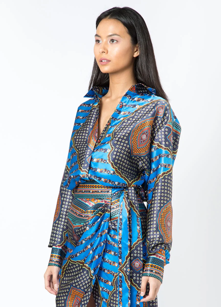 Blue silk blouse from Mina Binebine's Première Édition.